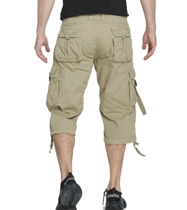 Rear view of khaki cargo capri pants showing functional pockets and drawstring hems