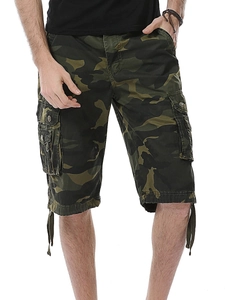 Detail view of cargo shorts with camouflage print, utility pockets, and drawstring hems