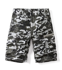 Detail of cargo short pockets with camouflage pattern and durable cotton canvas fabric