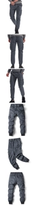 Detail of dark grey cargo joggers showing drawstring waist and large flap utility pockets