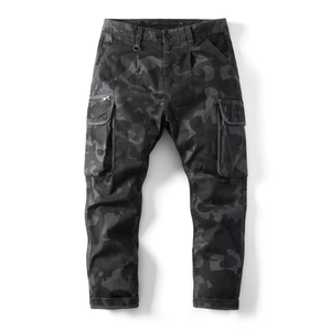 Detail of dark camo cargo pants showing tactical side pockets and zipper accents