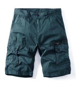 Men's loose fit multi-pocket cargo shorts in deep teal green with durable cotton canvas