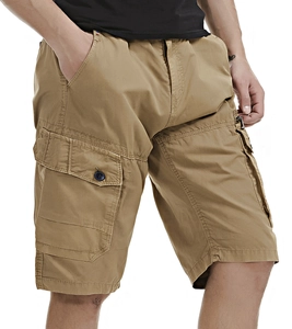 Detail view of khaki cargo shorts showing large flap pockets and durable twill fabric texture
