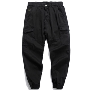 Men's black cargo jogger pants with elastic waist and multi-pocket utility design