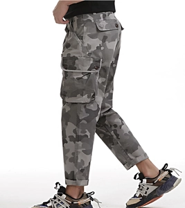 Detail view of mens grey camo cargo pants with large flap pockets and reinforced stitching