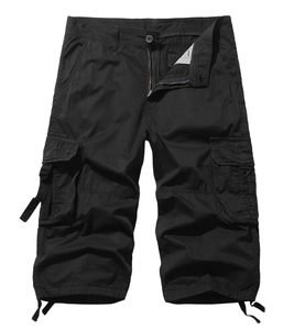 Detail of black cargo shorts featuring a metal zipper fly and durable button closure