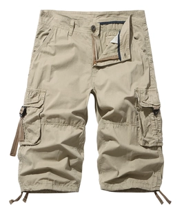 Detail view of khaki cargo shorts with utility flap pockets and metal button closure