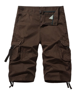 Detailed close-up of dark brown cotton cargo shorts with functional pockets and drawstring hem