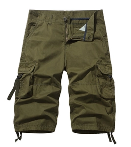 Detail of olive green cargo shorts featuring durable twill cotton and utility pockets