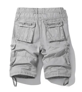 Detail view of grey cargo shorts back side featuring large flap pockets and drawstrings