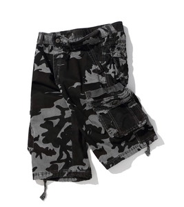 Detailed view of camo cargo shorts with flap pockets and adjustable drawstring hem