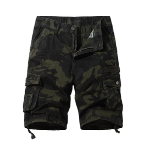 Detail of cargo shorts showing camo pattern, side flap pockets and durable cotton fabric