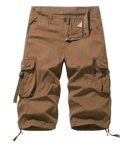 Detailed view of cargo shorts with large flap pockets and adjustable drawstring hem