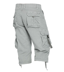 Detail of grey cargo shorts showing durable cotton fabric and large rear flap pockets