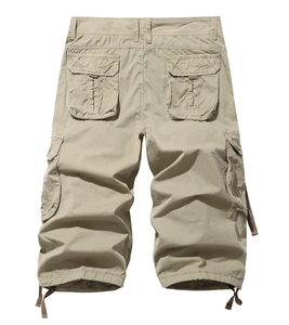 Detail view of khaki cargo shorts featuring large back flap pockets and adjustable drawstring cuffs