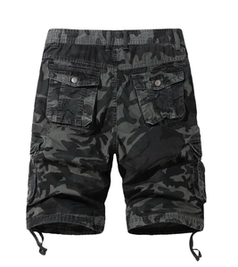 Detailed view of cargo shorts showing camouflage pattern and side flap pocket details
