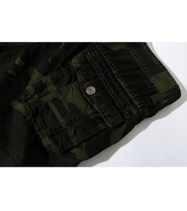 Close-up of durable camouflage cargo shorts featuring reinforced pockets and metal buttons
