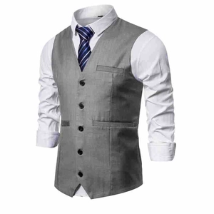 Detail view of light grey business vest with five black buttons and classic V-neckline