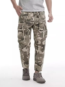 Men's camouflage cargo pants with multiple pockets and rugged outdoor design in jungle green