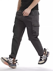 Men's loose camouflage cargo pants in dark grey with large side flap pockets