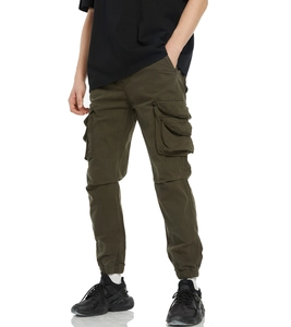 Macro detail of olive green cargo pants featuring a side flap pocket and ribbed ankle cuffs