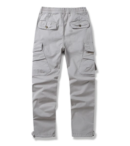 Rear view of men's casual cargo pants featuring elastic waist and utility flap pockets
