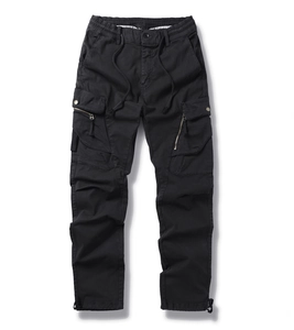 Detail of men's black cargo pants with elastic drawstring waist and large utility pockets