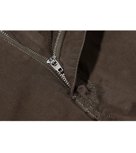 Close-up of durable metal zipper and reinforced double stitching on cargo shorts