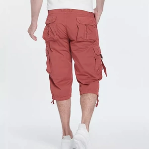 Men's brick red cargo capri shorts with multiple pockets and drawstring cuffs