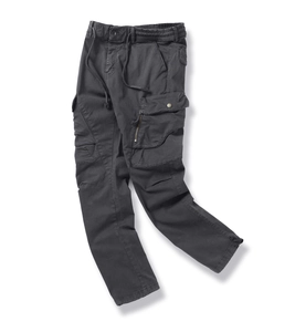 Detail of charcoal grey cargo pants featuring elastic drawstring waist and side flap pockets