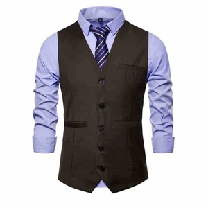 Close-up of a brown slim fit waistcoat with light blue shirt and striped business tie