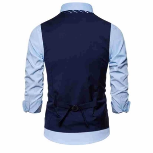 Detail view of navy blue vest back featuring an adjustable metal buckle strap and slim fit style