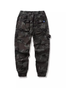 Men's camouflage cargo pants featuring elastic cuffs and rear pockets in a back view
