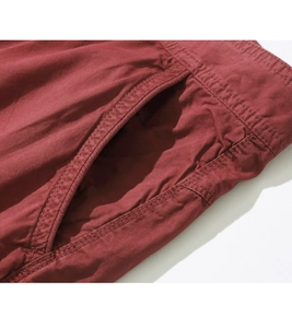 Macro shot of cargo pants pocket with durable double stitching and twill fabric detail