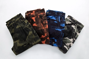 Detail showing four camouflage cargo shorts in green, orange, blue and grey patterns