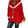 Detail view of red oversized hoodie featuring a bold white V-stripe and casual loose fit