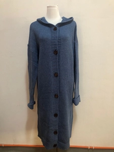 Close-up of chunky knit pattern and matching buttons on grey hooded cardigan sweater