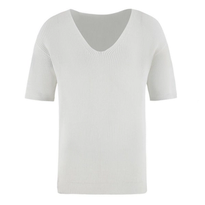 Close-up of white men's short sleeve knit shirt featuring a modern deep V-neckline