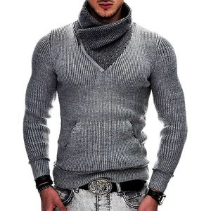 Detail of men's grey ribbed knit sweater featuring asymmetrical high neck zipper and pocket