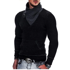 Detail of slim fit knit sweater with grey diagonal zipper collar and black knit texture