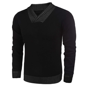 Detail of V-neckline with grey striped accents on a classic black knitted sweater