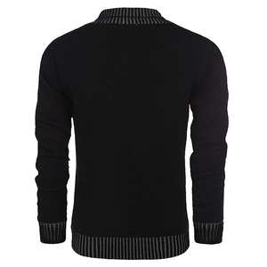 Macro shot of men's black knit sweater back with grey contrast ribbed hem and cuff detail