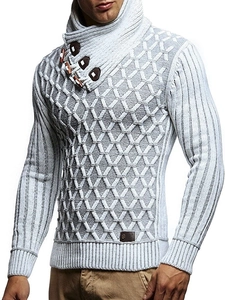 Detail of grey men's knit sweater featuring faux leather buckle and horn buttons on collar