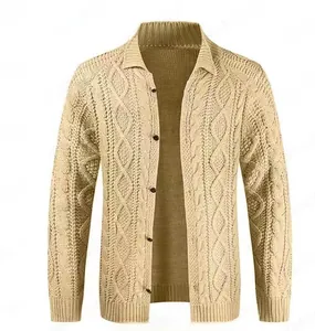 Detail of men's chunky knit cardigan with cable pattern and dark button closure