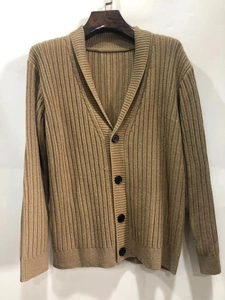 Detail view of camel ribbed knit cardigan for men featuring classic V-neck and black buttons