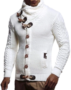 Detail view of white chunky knit sweater with wooden toggle buttons and textured pattern