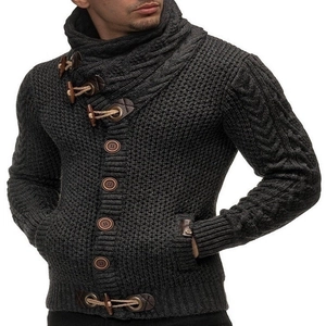 Detail of high neck dark grey knit cardigan with wooden horn buttons and cable knit texture