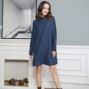 Detailed knit texture and drop shoulder design of this navy blue sweater dress