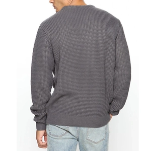 Detailed back view of a men's dark grey knit sweater with waffle weave texture