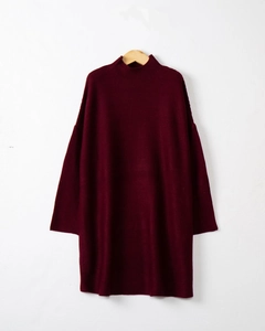 Close-up of mock neck burgundy oversized knit sweater dress for women in autumn and winter